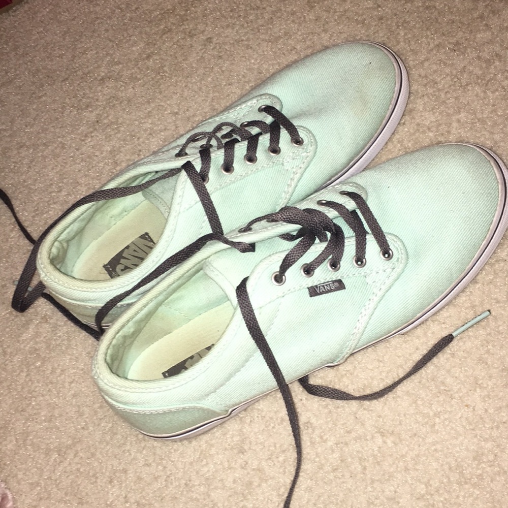 mint green vans with grey shoe laces